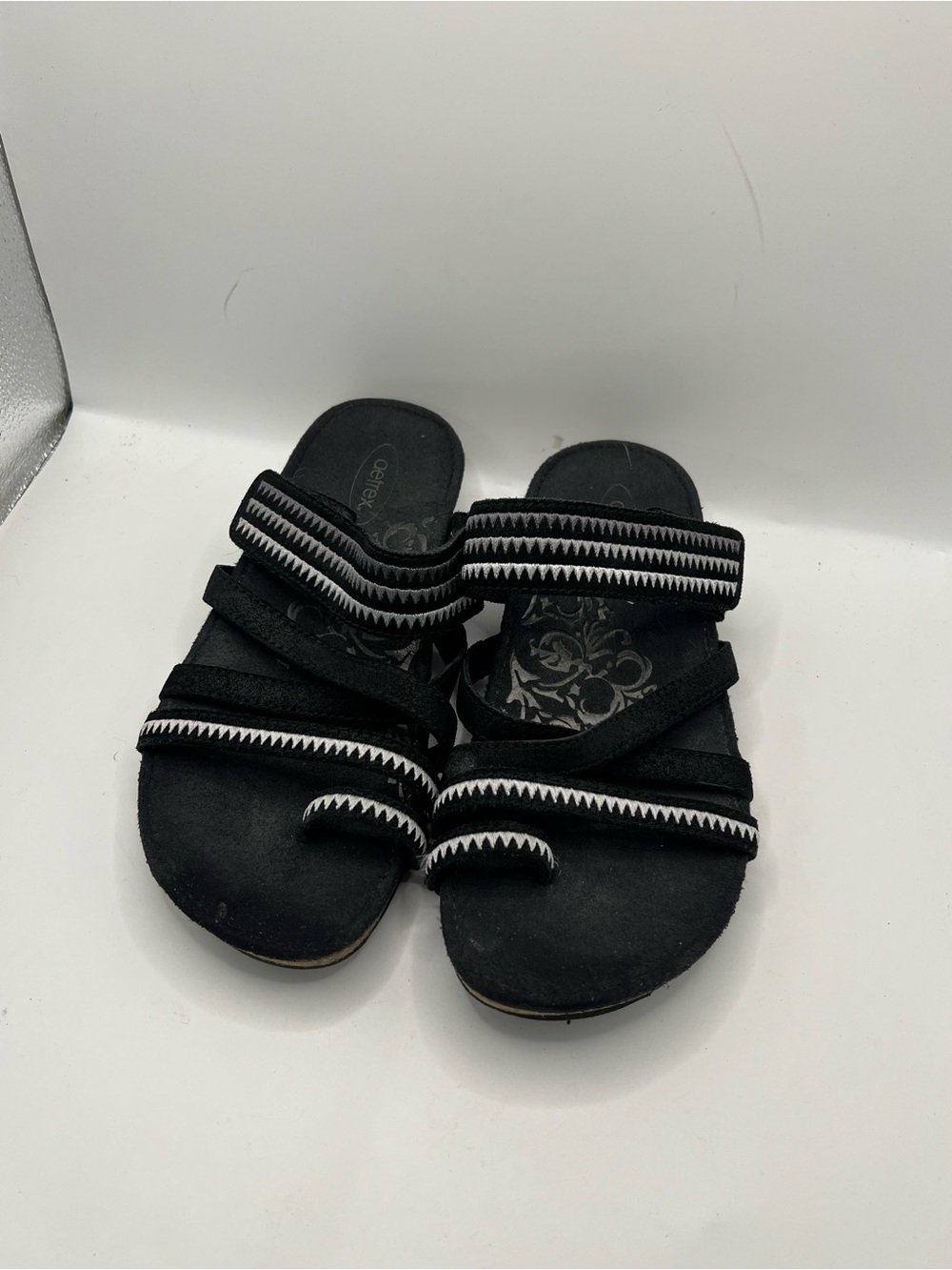 Aetrex Black Slip-On Sandals with White Zigzag Trim - Picture 10 of 10
